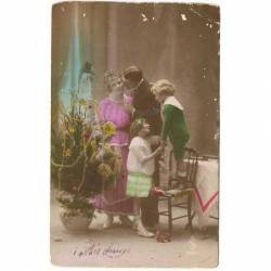 Postal romántica familia en Navidad. Escrita y fechada en 1918