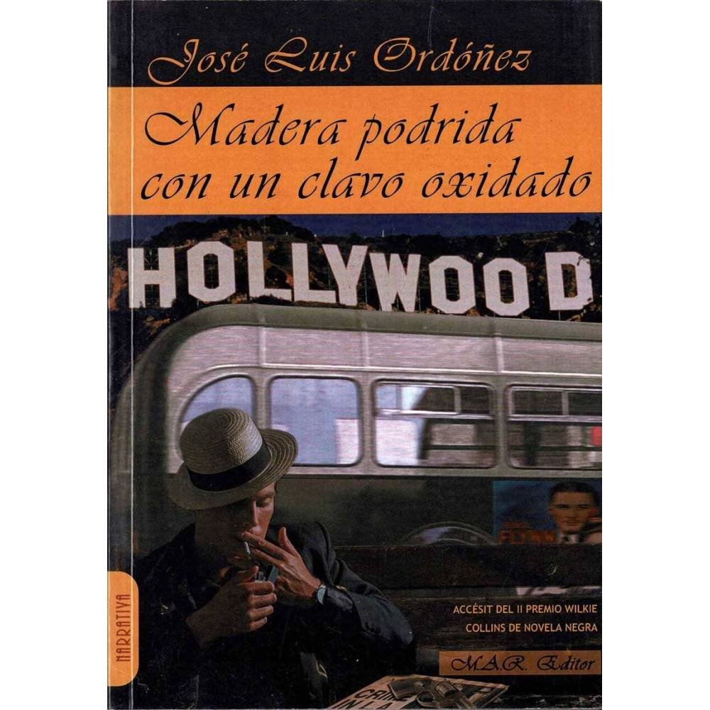 Madera podrida con un clavo oxidado - José Luis Ordóñez